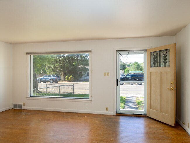 Living room and entry door - 1616 N Arthur Ave