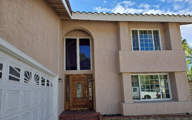 Front entrance and windows - 20570 Missionary Ridge St