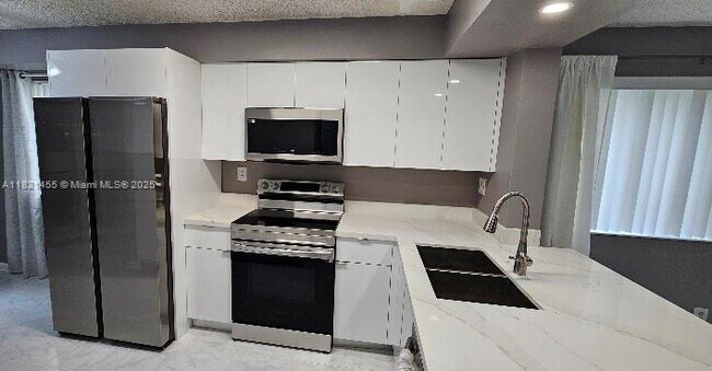 Foto del edificio - 3625 Coral Springs Dr