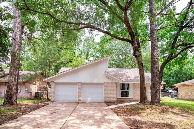 Foto del edificio - 9214 Woodland Oaks Dr