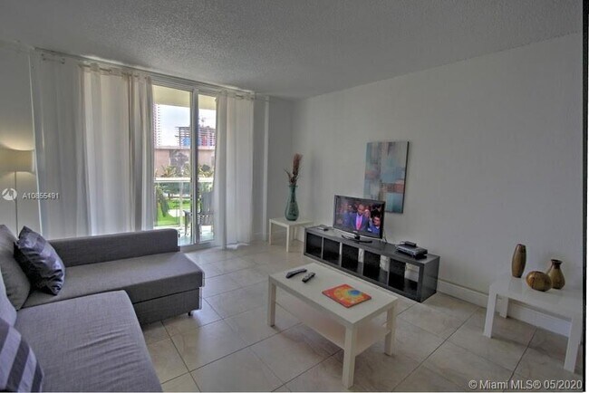 Building Photo - 19370 Collins Ave