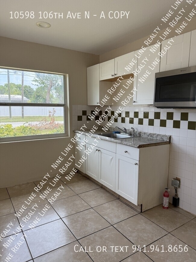 Foto del edificio - 10598 106th Ave N