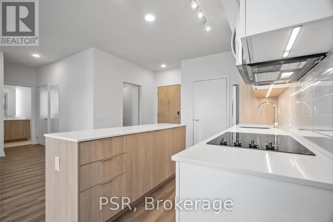 Photo du bâtiment - 4235-4235 Confederation Pkwy