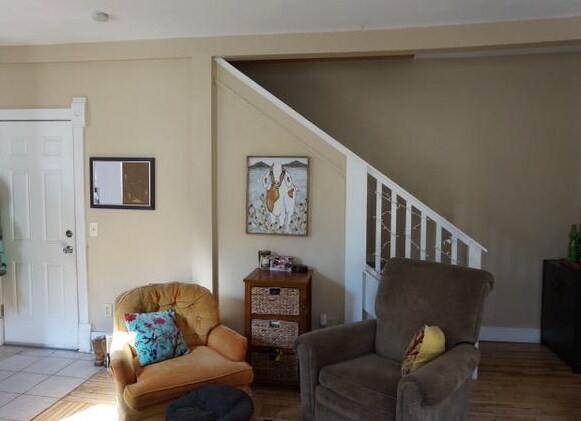 Living room - stairs to upper loft and bedroom - 2102 25th Ave S