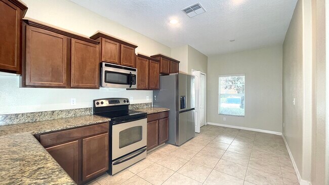 Foto del edificio - 4167 Shade Tree Ln