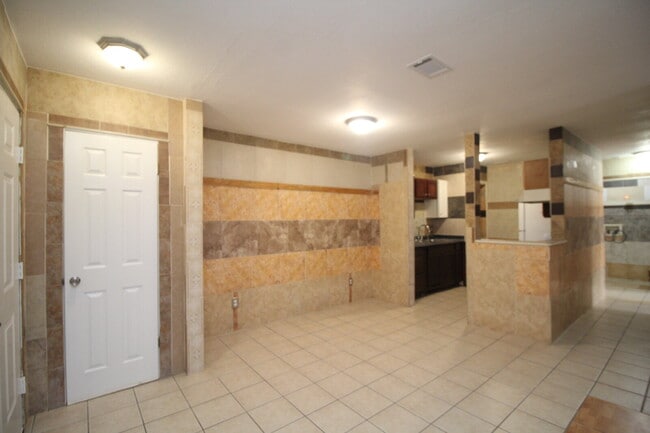 Building Photo - Updated 2BR/1BA Brick Duplex in North Pensacola with Tile Flooring Throughout, Included Utilities...