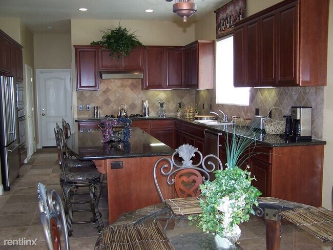 Building Photo - 4 br, 2.5 bath House - Calypso Bay