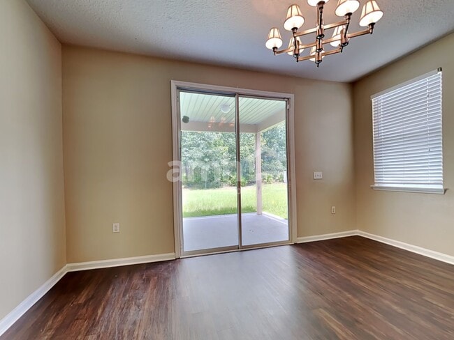 Building Photo - 11293 Justin Oaks Dr N