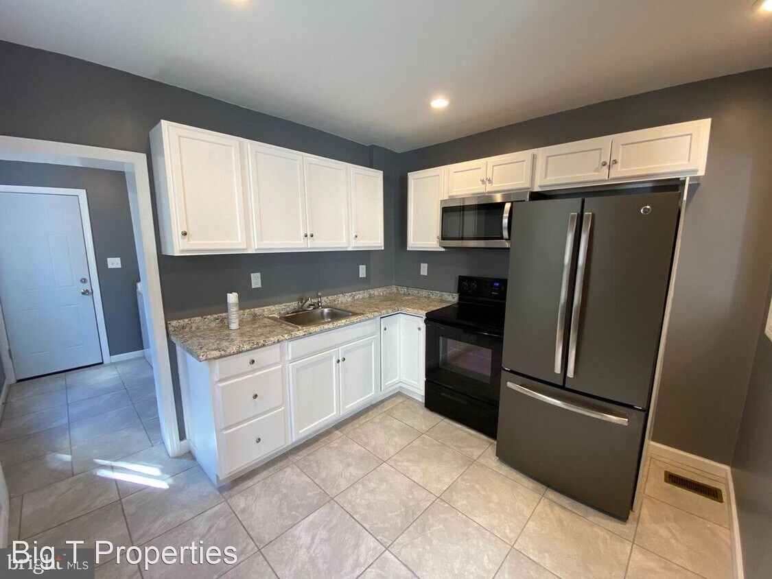 Foto principal - 4 br, 1.5 bath House - 1316 W 4th Street