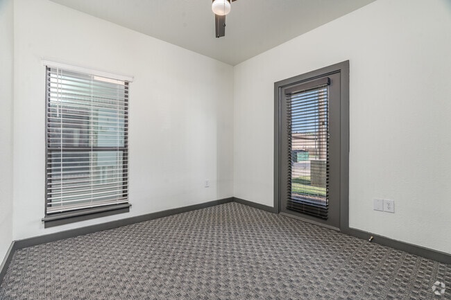 3BR, 1BA - 977SF - Primary Bedroom - The Talon Apartments