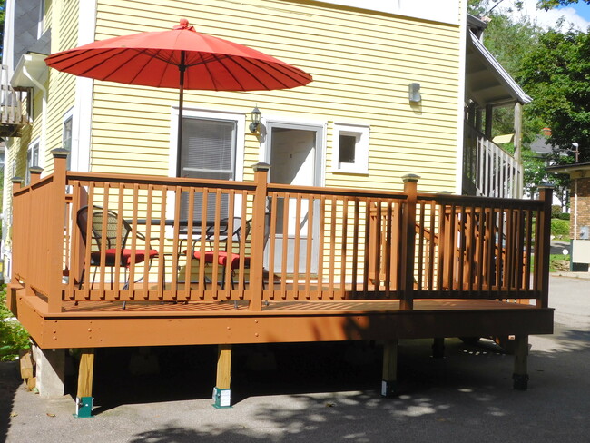 Backyard porch with patio furniture - 429 Stanwood St