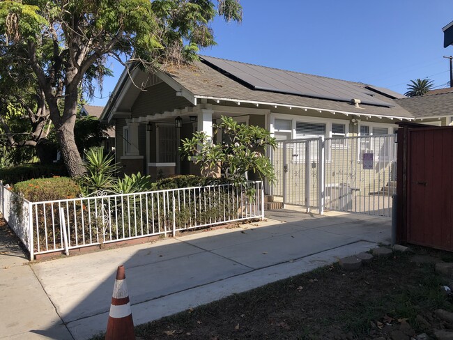 gate next to house, entrance to parking - 766 Temple Ave