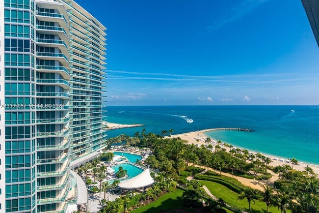 Building Photo - 10275 Collins Ave
