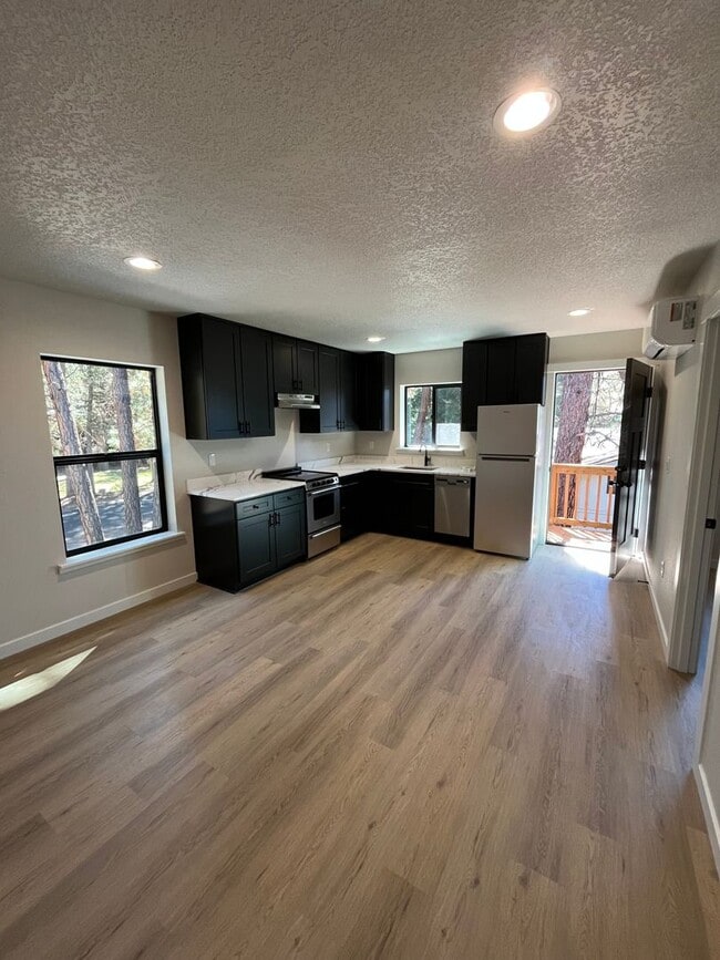 Building Photo - Spectacular BRAND NEW 1-bed/1-bath apartment with Mt Views! ***Utilities included!***