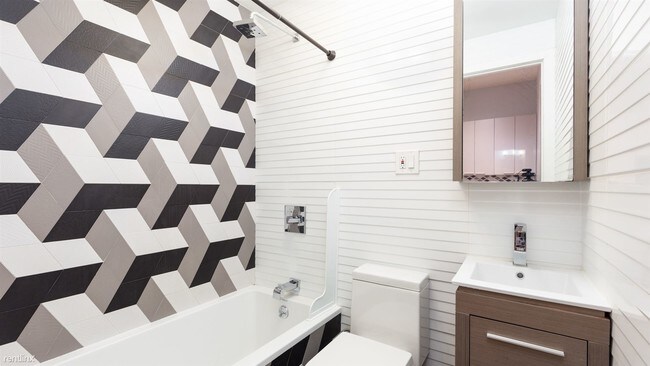 Foto del edificio - 4 br, 2 bath Apartment - 528 Grand St