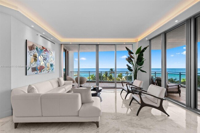 Building Photo - 10295 Collins Ave