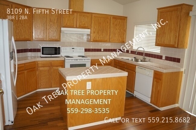 Building Photo - 8109 N. Fifth Street-