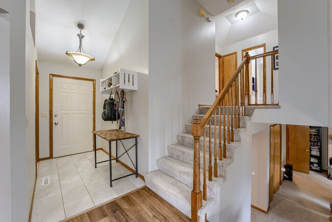 Building Photo - Bright & Airy Tri-Level With Finished Base...