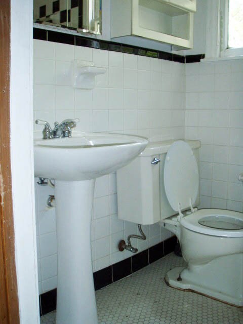 Tile bathroom with pedestal sink and full-size tub & shower - 4812 Birchman Ave