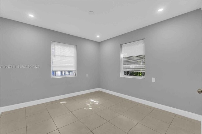 Building Photo - 6940 NW 6th Ct