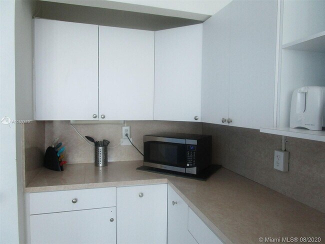 Building Photo - 5445 Collins Ave
