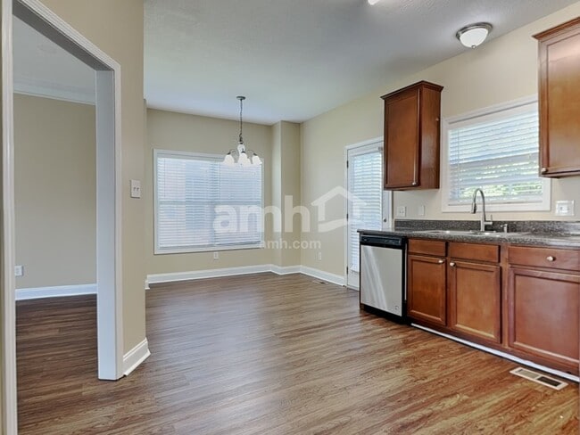 Building Photo - 5721 Rhyne Cove Ln