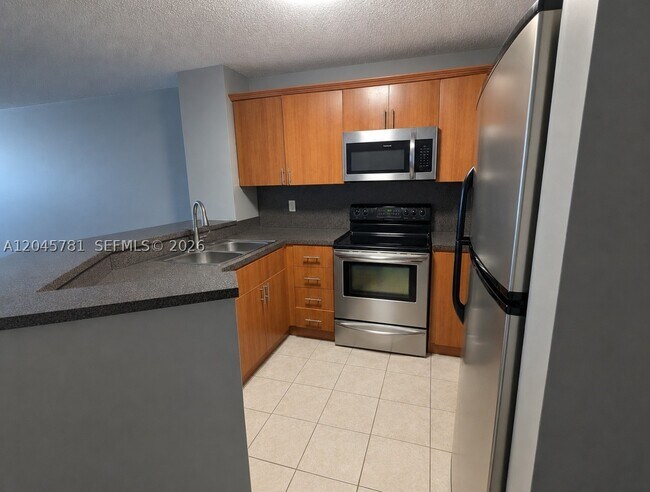 Building Photo - 8750 N Sherman Cir