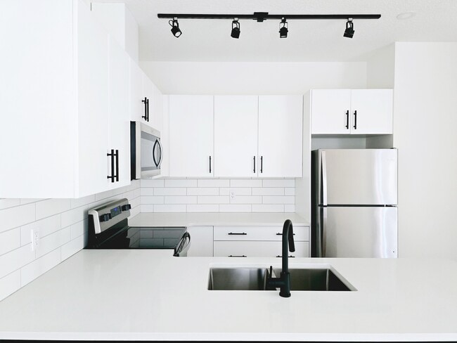 Building Photo - 9209-9117 117 Ave NW