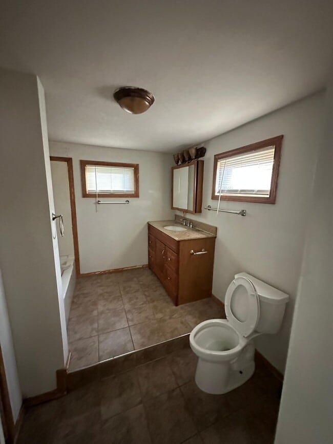 Building Photo - **Coming Soon!** Spacious Home with Large Patio, Huge Kitchen & Convenient Location!