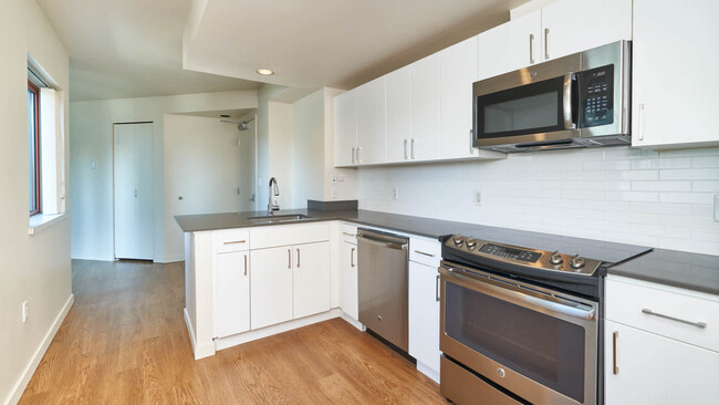 Kitchen with Stainless Steel Appliances - Harbor Steps