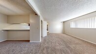 Located at 604 S Eastern St in Wichita, Kansas, this single-story, 3-bedroom, 1-bathroom home offers a functional and comfortable layout across a well-utilized floor plan. The living area is carpeted throughout, featuring neutral beige tones, textured ceilings, and windows fitted with vertical blinds that allow natural light to filter in. A pass-through counter connects the kitchen to the living space, creating an open feel. The kitchen is equipped with warm wood-toned cabinetry, a white refrigerator, a built-in sink, and overhead lighting beneath the upper cabinets. The generously sized primary bedroom features dual bi-fold closet doors providing ample storage, along with a window that brings in natural light. The two additional bedrooms are carpeted with neutral walls, each featuring windows with blinds and closet access. The full bathroom is finished with wood-look vinyl plank flooring, a wood-toned vanity with a countertop sink, a white tiled tub-shower combination, and a textured ceiling. A hallway connects the bedrooms and bathroom, offering a practical flow throughout the home. The overall design is clean, straightforward, and move-in ready.