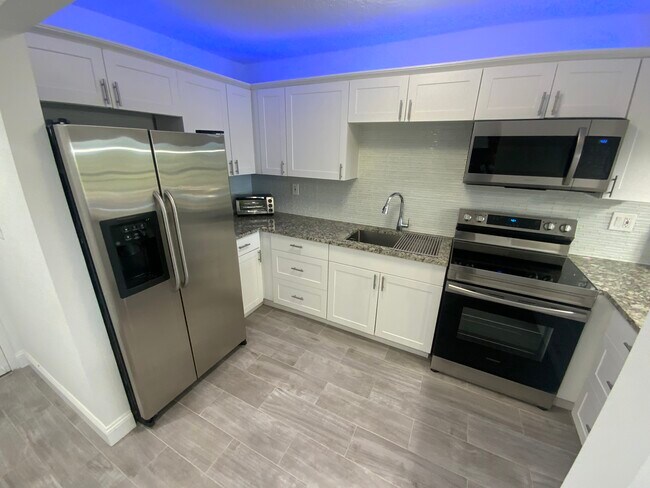 Building Photo - 6444 Collins Ave
