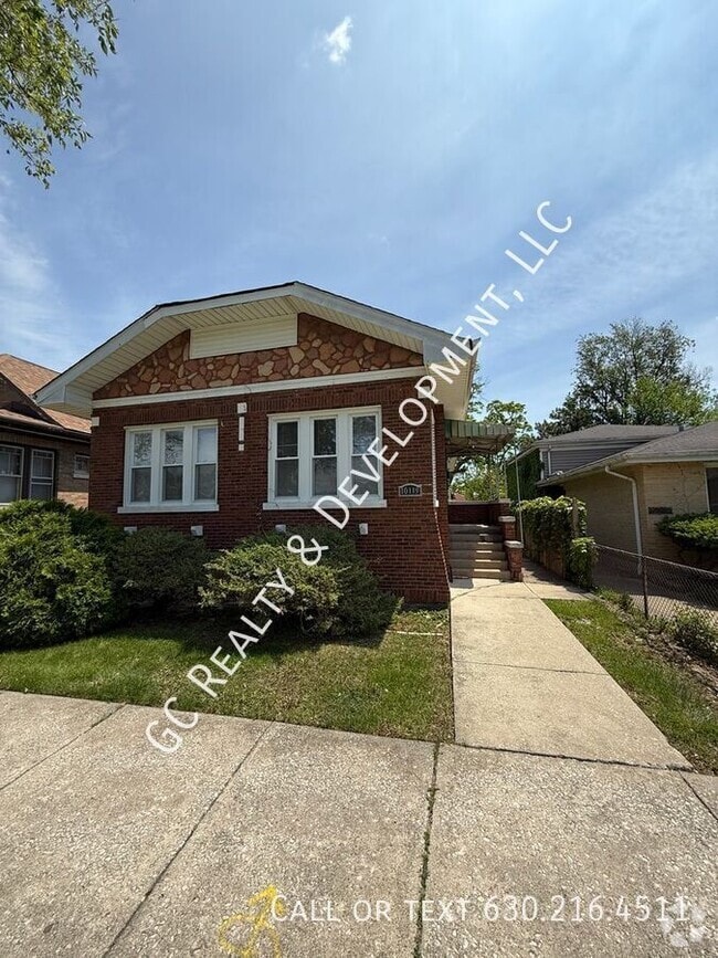 Building Photo - 10119 S Peoria St
