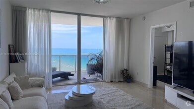 Building Photo - 18201 Collins Ave