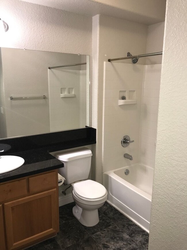 Building Photo - Downstairs 2BR/2BA Condo available now! POOL/SPA | WSG Paid by Owner!