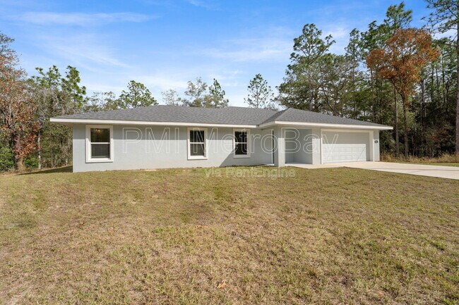 Foto del edificio - 9461 N Sandree Dr