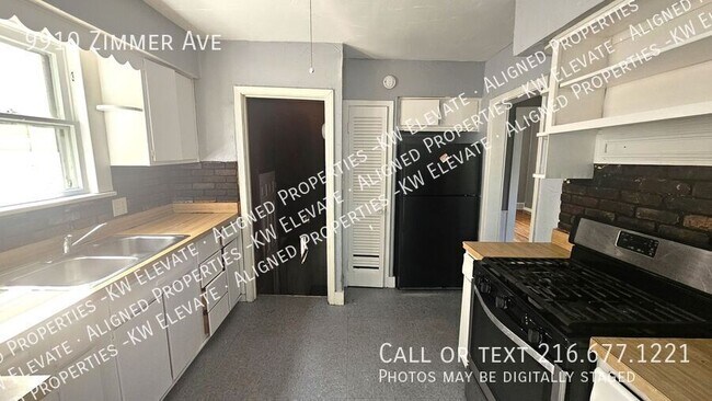 Foto del edificio - 9910 Zimmer Ave
