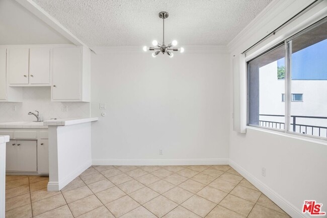 Building Photo - 7548 Hampton Ave