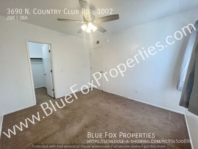 Building Photo - 3690 N. Country Club Rd #1002