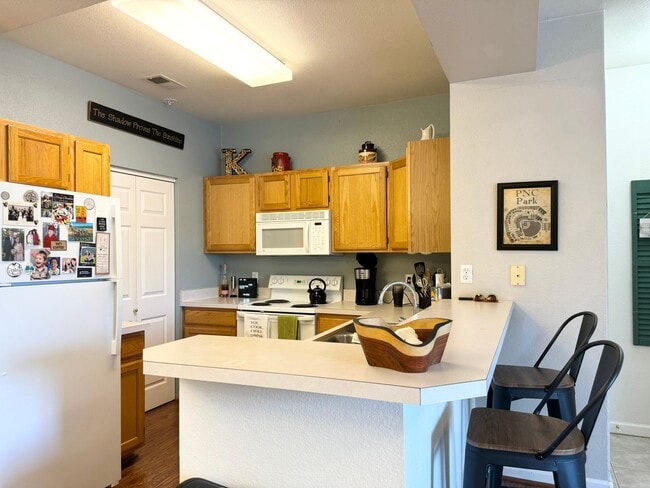 Building Photo - 2 Bedroom, 2 Bathroom Condo In Fort Collins with Pool and Clubhouse Access! Great Location Harmon...