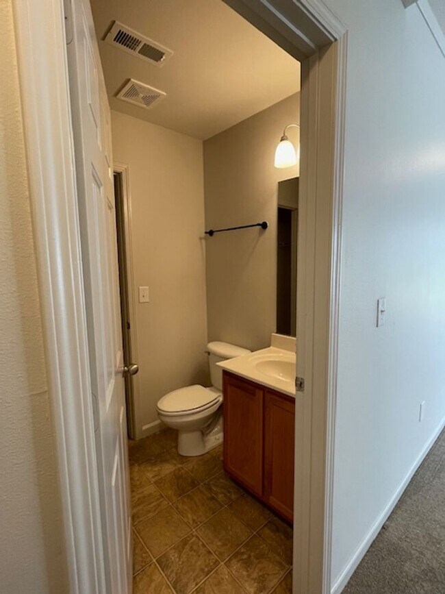 Building Photo - Single Story - 3 bedrooms, 2 baths, spacious living room, kitchen & a 2 car garage, located on a ...