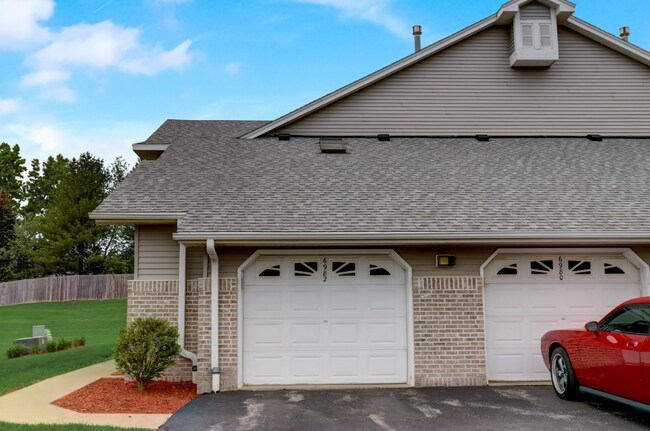 front/garage - 6982 S Rolling Meadows Ct