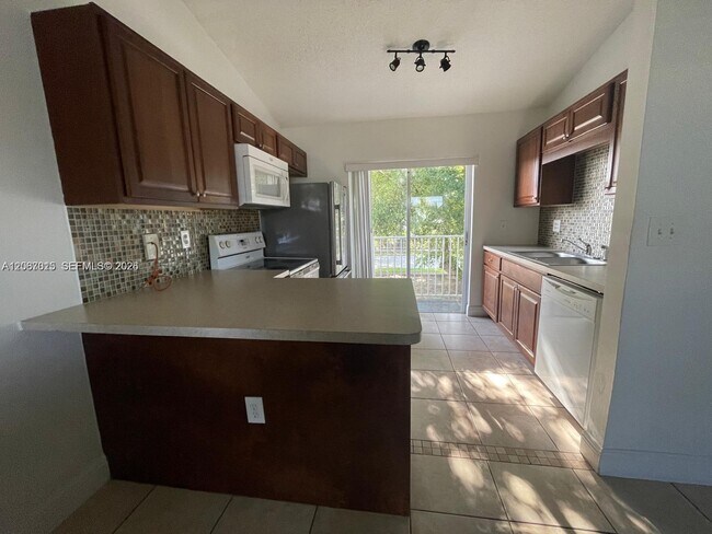 Building Photo - 7991 SW 152nd Ave