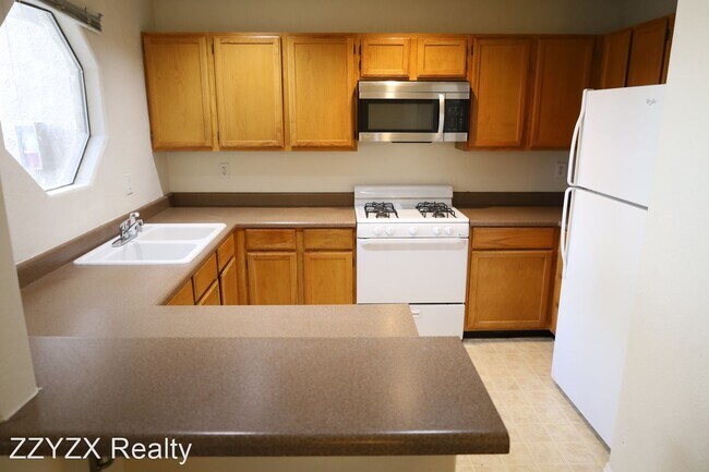 Building Photo - 2 br, 1 bath House - 5002 S Rainbow Blvd #103