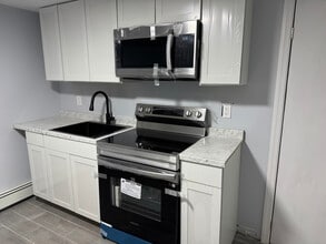 Building Photo - 390 14th Ave