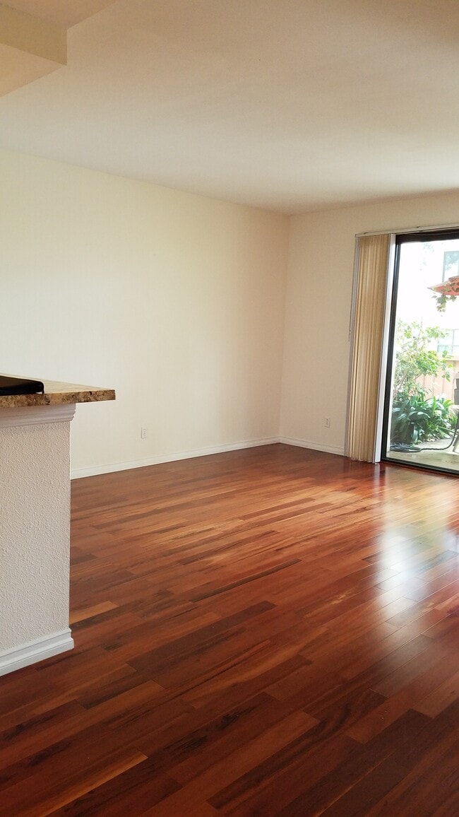 Living room floor: Tiger Wood - 4059 Carmel View Rd