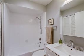 Two full bathrooms; Updated in 2017 with new cabinetry, toilets, sinks/faucets, etc. Brand new rods and shower curtains were just installed. The master bathroom has two sinks. The guest bathroom is adjoined to the laundry room that has Samsung washer and dryer in unit. - 282 Dolphin Cove Ct