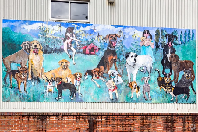 Artist Mary Pratt created murals for the park depicting residents’ pets.