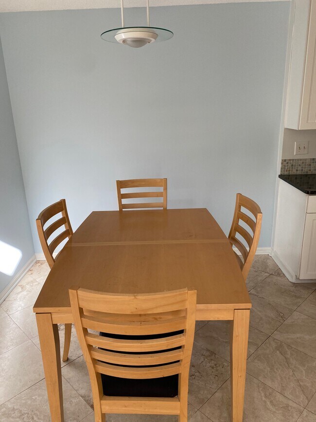 Large dining space. Furniture not included. - 2696 Forest Ridge Dr