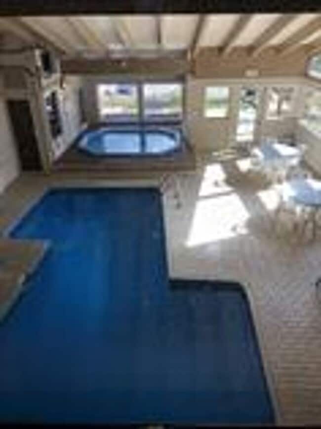 Building Photo - Wildernest 2 Bedroom 2 Bathroom includes all utilities!  Flexible lease terms.